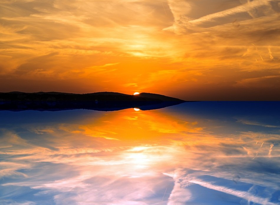 reflection of orange sunset in the sea