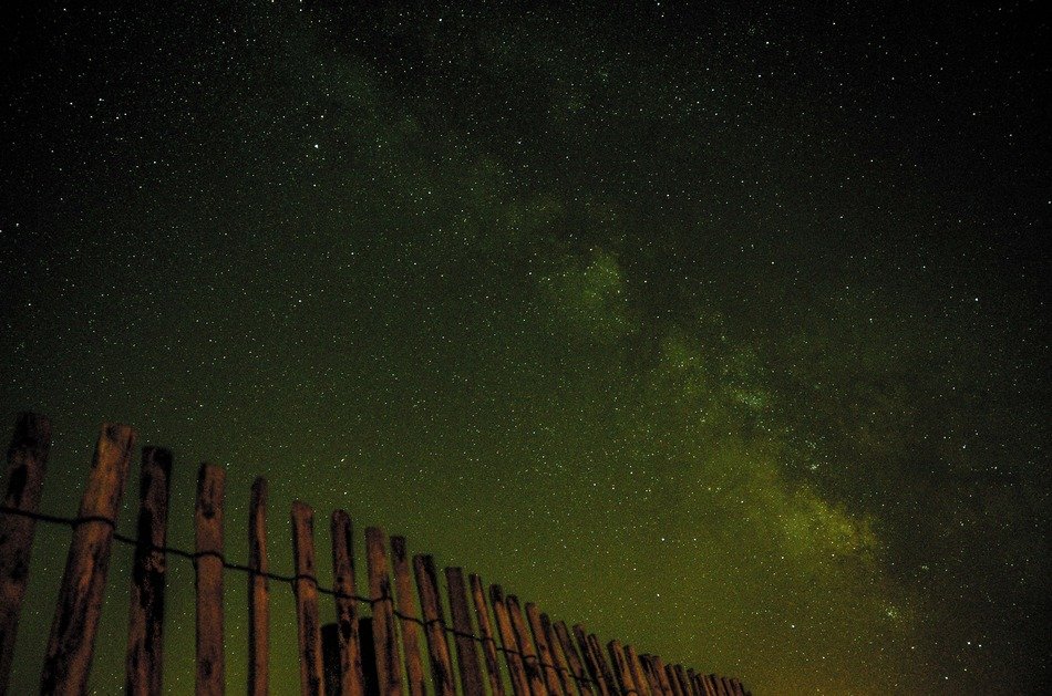 milky way in the green night sky