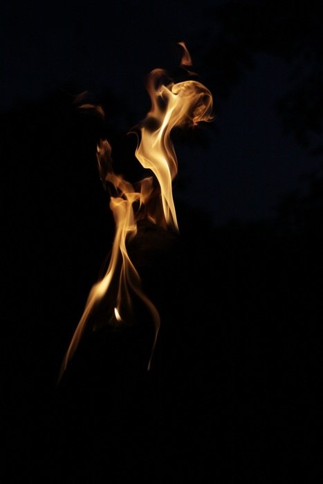 the flames through the black night
