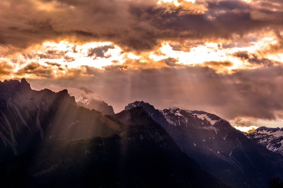 Mountain peaks in the rays of sunlight