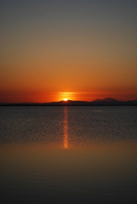 Photo of the orange sunset on the lake