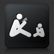 Black Square Button with Parent Reading to the Child