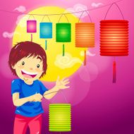 Boy holding paper lantern