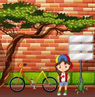 Little girl standing bicycle