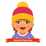 Baby girl in pink hat smiling and watching