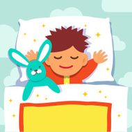 Baby boy sleeping with his rabbit toy