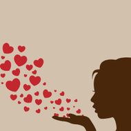 Woman blowing heart vector