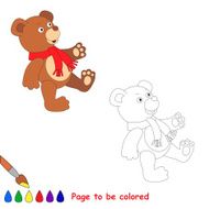 Toy bear wearing red scarf