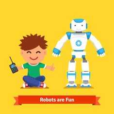 Little boy playing with remote controlled robot