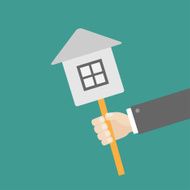 Businessman hand holding paper house on the stick Flat design
