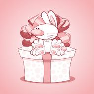 Cute rabbit sitting on the present
