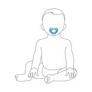 Sweet little boy sitting and smiling with nipple