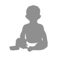 Sweet little boy sitting and smiling isolated on white backgrou