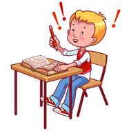 Joyful schoolboy behind a school desk with book