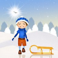 child with sleigh on snow