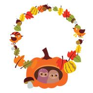 Autumn wreath with cute owls in a pumkin