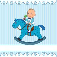 Little boy riding a rocking horse