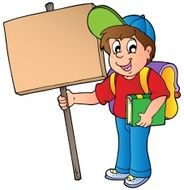 School boy holding wooden board