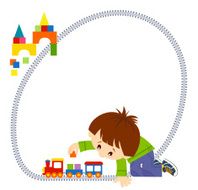 Happy boy playing toy train