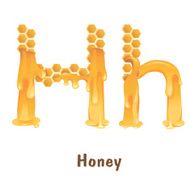 The letter H made from honeycombs