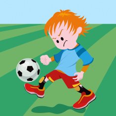 school boy playing soccer