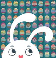 Easter bunny on a background of painted eggs