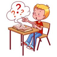 Surprised schoolboy behind a school desk with book