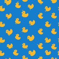 Cute pattern with yellow ducks on a blue background
