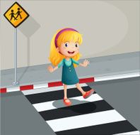 Young lady crossing the pedestrian lane