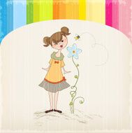 small young lady who smells a flower N3