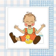 baby boy playing with his duck toy N12