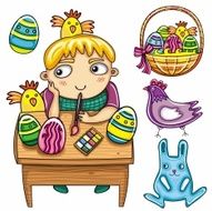 Boy painting Easter eggs