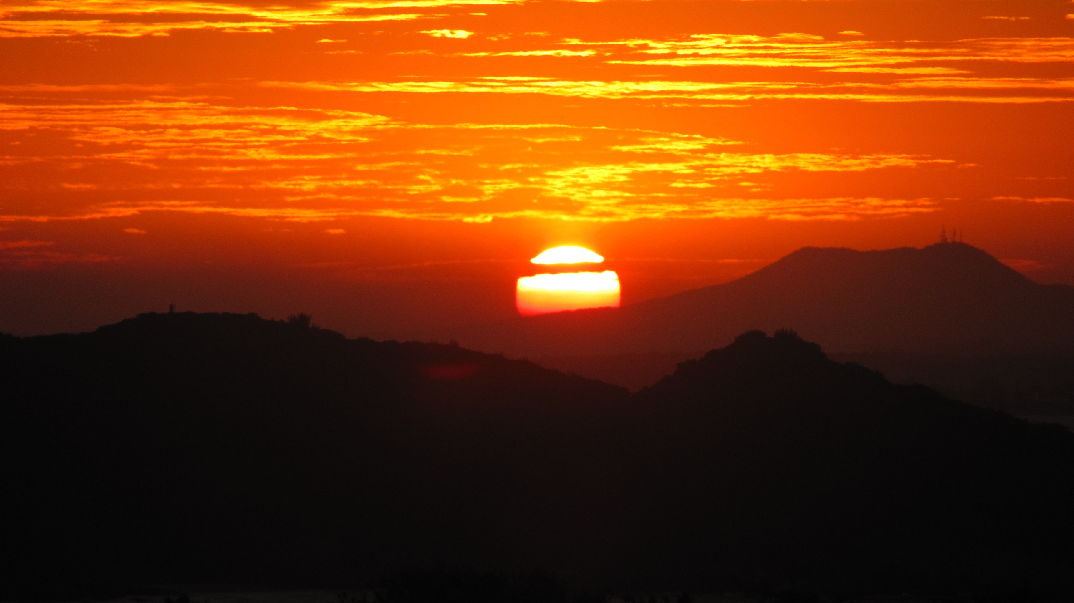 Orange sunset in the mountains free image