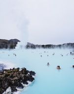 people swim in the blue lagoon