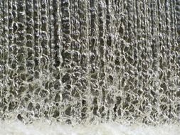 Streams of a waterfall from natural water