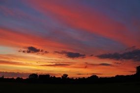 landscape with orange sky during sunset