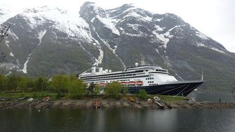 Cruise liner among the fjords of Norway