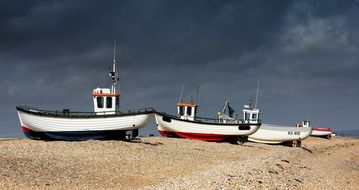fishing boats with no water around