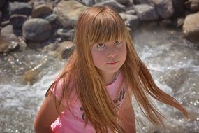 portrait of the girl with long blonde hair