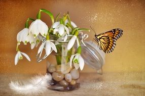 Butterfly on flowers in a vase