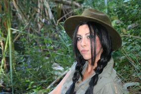 beautiful girl scout in the forest