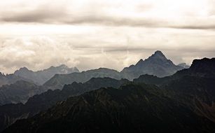 landscape in the mountains under white clouds