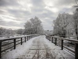 Wooden bridge in the snow