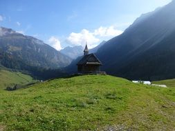 chapel on a mountain on beautiful landscape