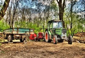 tractor with a wooden trailer