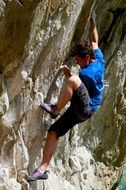 climber on a rock wall