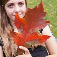 girl with autumn oak leaf