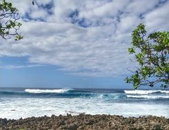 ocean waves on the beach in Hawaii