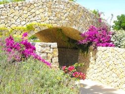 stone bridge in the garden on the Mediterranean coast