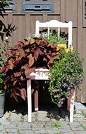 decorative flower arrangement on a chair